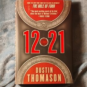 Hardcover 12*21 Signed by Dustin Thomason